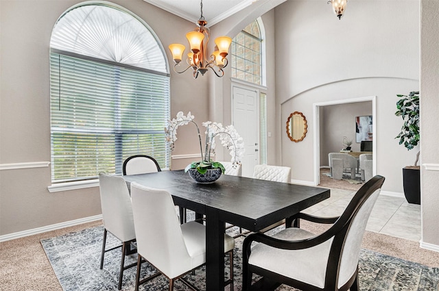 3501 Thorp Springs Dr, Plano, TX 75025 - dining area featuring a chandelier, carpet floors, crown molding, and baseboards