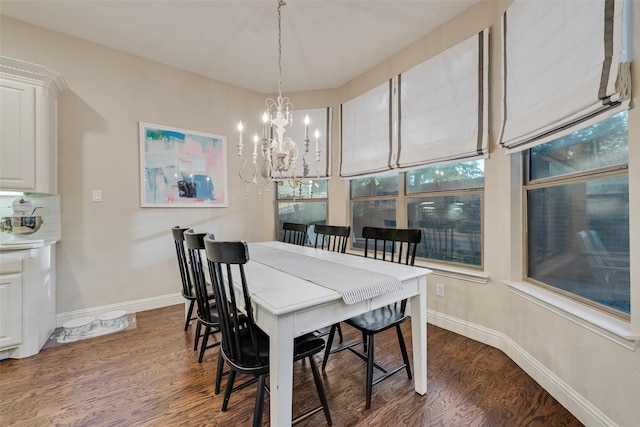 2307 Grizzly Run Ln, Euless, TX 76039 - dining area with a chandelier, dark wood finished floors, and baseboards