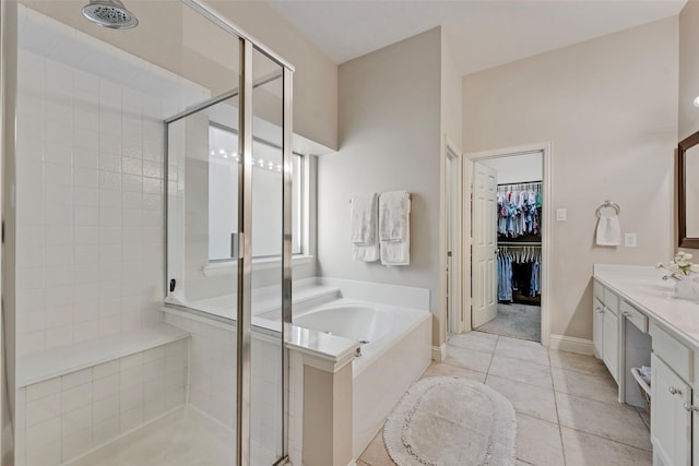 2307 Grizzly Run Ln, Euless, TX 76039 - full bathroom with a stall shower, a bath, tile patterned floors, and vanity