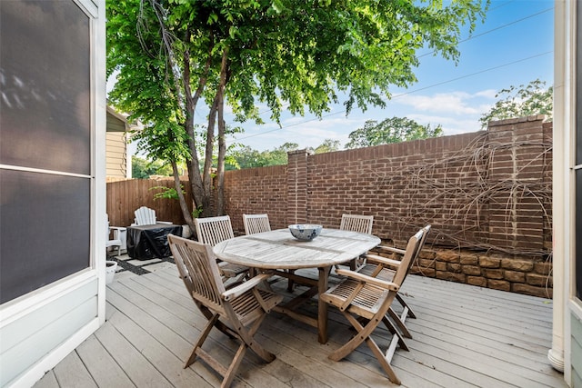 2307 Grizzly Run Ln, Euless, TX 76039 - wooden terrace featuring outdoor dining area and fence