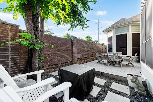 2307 Grizzly Run Ln, Euless, TX 76039 - wooden terrace featuring outdoor dining area and a fenced backyard
