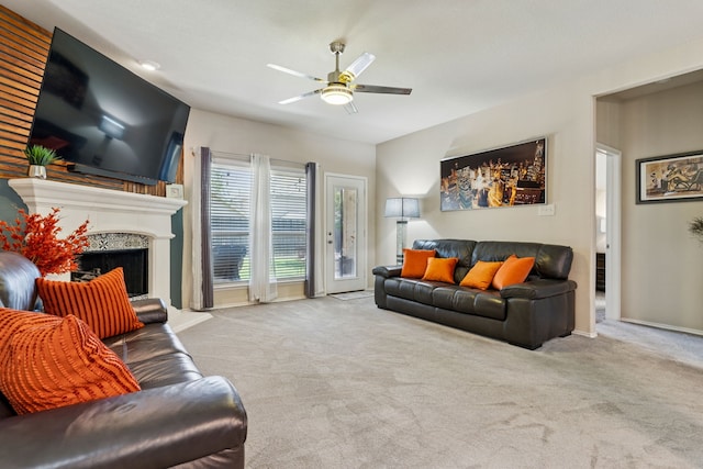 9812 Beaver Dam Ln, Mckinney, TX 75071 - living area with ceiling fan, carpet, a premium fireplace, and baseboards