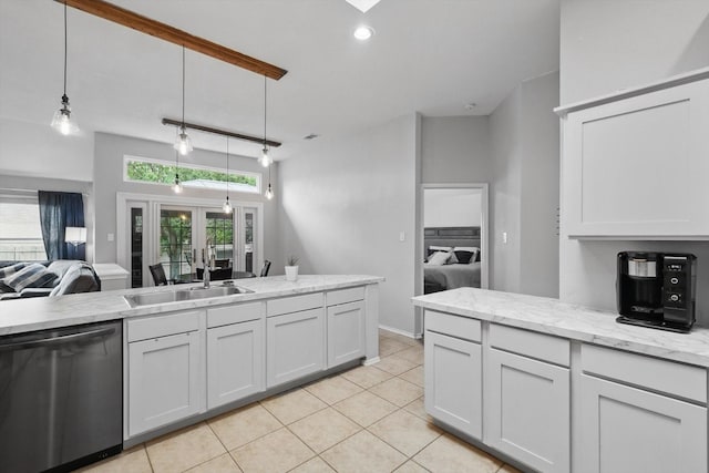 713 Bridle Trl, Saginaw, TX 76179 - kitchen featuring dishwasher, light tile patterned floors, a sink, hanging light fixtures, and open floor plan