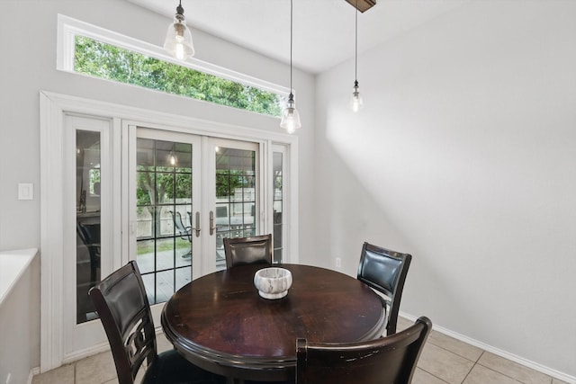 713 Bridle Trl, Saginaw, TX 76179 - dining area featuring french doors, light tile patterned floors, and baseboards