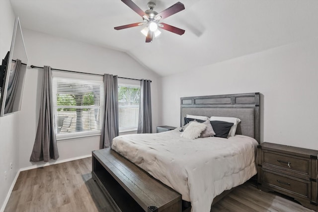 713 Bridle Trl, Saginaw, TX 76179 - bedroom with lofted ceiling, light wood-type flooring, a ceiling fan, and baseboards