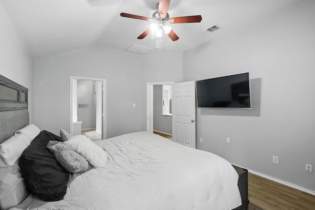 713 Bridle Trl, Saginaw, TX 76179 - bedroom featuring lofted ceiling, wood finished floors, baseboards, a ceiling fan, and ensuite bath