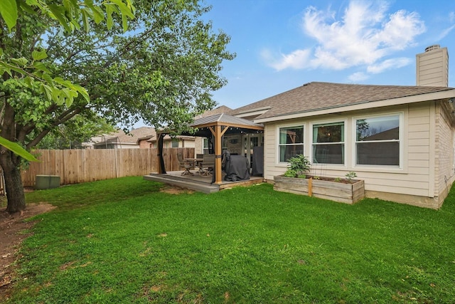 713 Bridle Trl, Saginaw, TX 76179 - back of property with a gazebo, a chimney, and roof with shingles