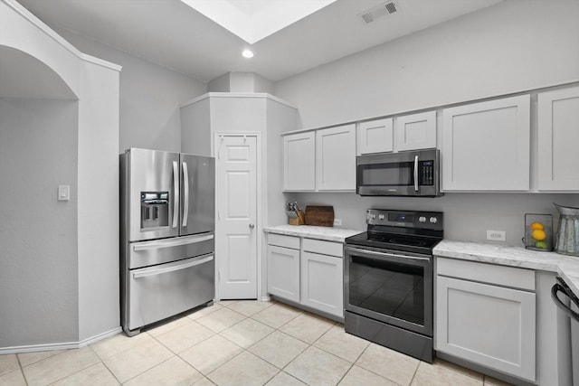 713 Bridle Trl, Saginaw, TX 76179 - kitchen featuring stainless steel appliances, light tile patterned floors, recessed lighting, baseboards, and light stone counters