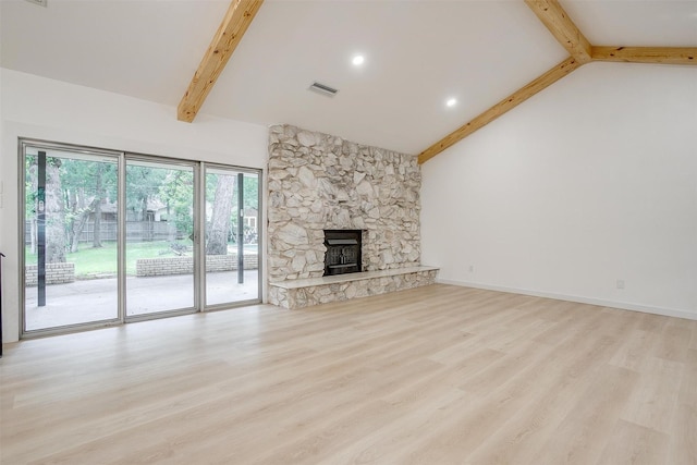 2317 Vega St, Grand Prairie, TX 75050 - unfurnished living room with beam ceiling, wood finished floors, a fireplace, and high vaulted ceiling