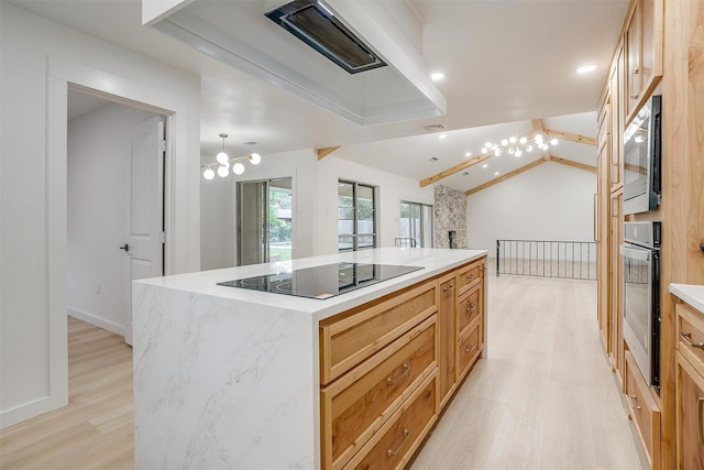 2317 Vega St, Grand Prairie, TX 75050 - kitchen with appliances with stainless steel finishes, light wood-type flooring, a chandelier, a center island, and vaulted ceiling