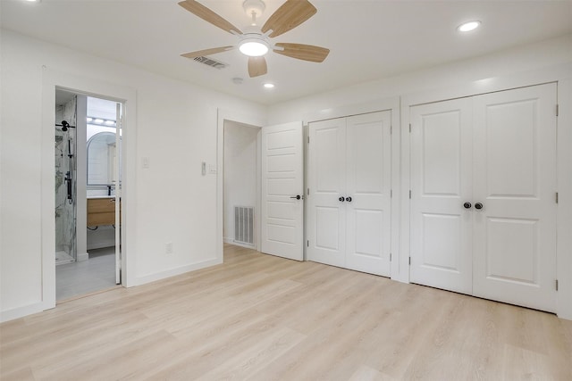 2317 Vega St, Grand Prairie, TX 75050 - unfurnished bedroom with multiple closets, light wood-style floors, recessed lighting, ensuite bath, and ceiling fan