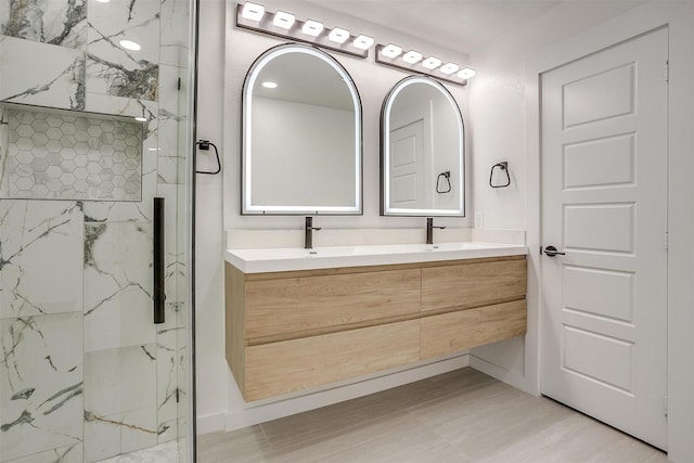 2317 Vega St, Grand Prairie, TX 75050 - full bath featuring double vanity, a marble finish shower, and wood finished floors