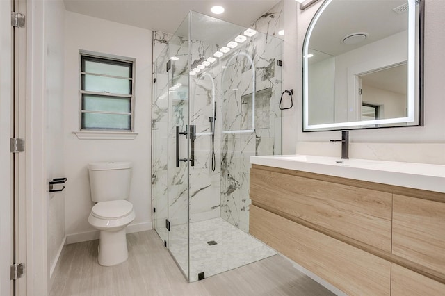 2317 Vega St, Grand Prairie, TX 75050 - full bathroom with vanity, a marble finish shower, and wood finished floors
