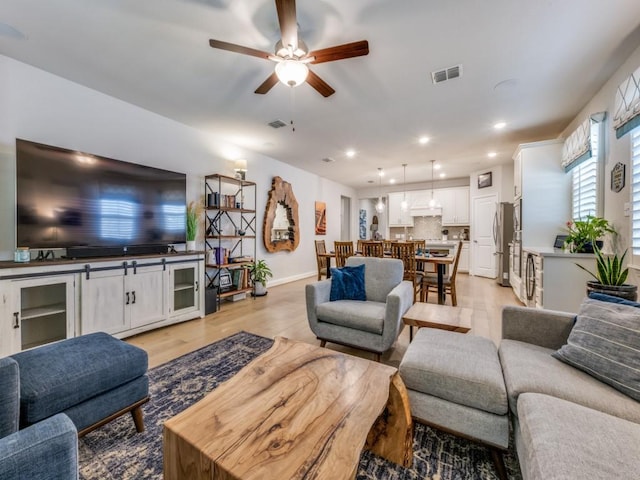 217 Fulton St, Oak Point, TX 75068 - living room with a ceiling fan, light wood-type flooring, recessed lighting, and baseboards