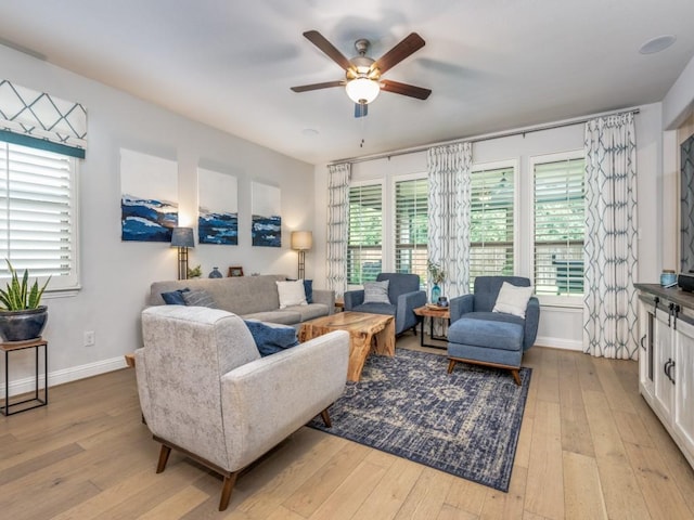 217 Fulton St, Oak Point, TX 75068 - living area featuring a ceiling fan, baseboards, and light wood-style floors