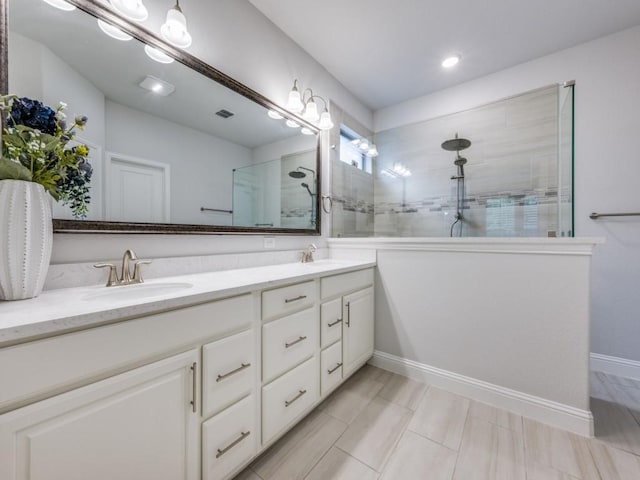 217 Fulton St, Oak Point, TX 75068 - bathroom with walk in shower, double vanity, and baseboards