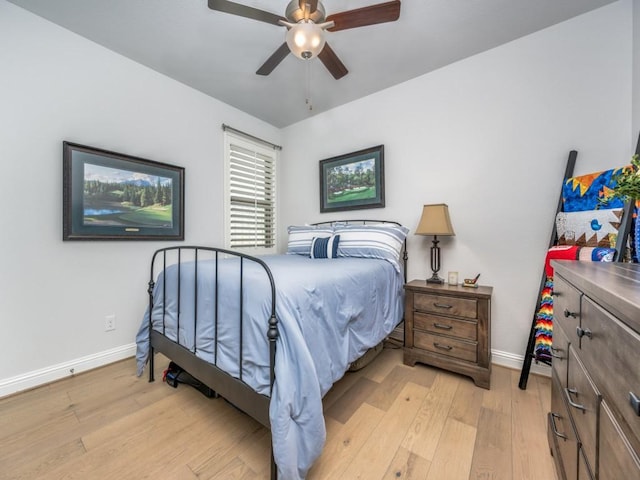 217 Fulton St, Oak Point, TX 75068 - bedroom featuring baseboards, light wood-style floors, and a ceiling fan