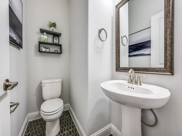 217 Fulton St, Oak Point, TX 75068 - half bath featuring toilet and baseboards