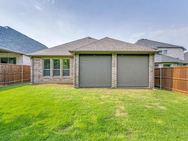 217 Fulton St, Oak Point, TX 75068 - back of house featuring brick siding, a garage, and a shingled roof