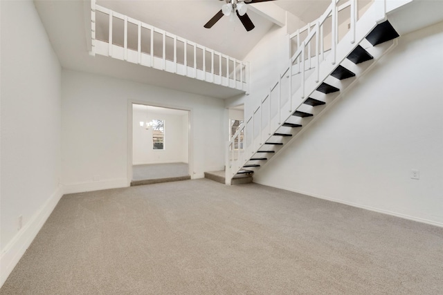 129 Western Ave, Saginaw, TX 76179 - unfurnished living room with carpet floors, stairs, ceiling fan, baseboards, and a chandelier
