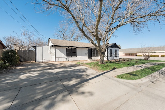 129 Western Ave, Saginaw, TX 76179 - ranch-style home with fence and concrete driveway