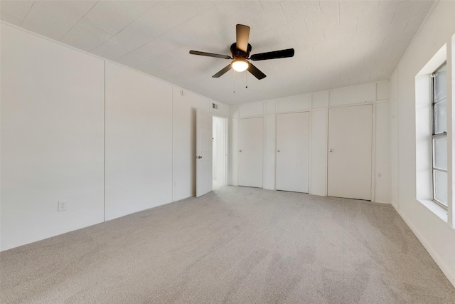 129 Western Ave, Saginaw, TX 76179 - unfurnished bedroom with light carpet and ceiling fan