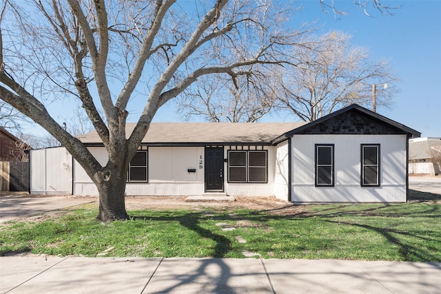 129 Western Ave, Saginaw, TX 76179 - ranch-style house with a front lawn and a shingled roof