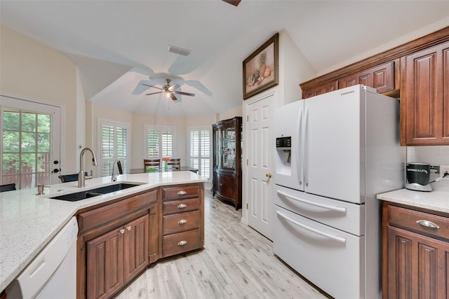 6729 Lucas Ln, North Richland Hills, TX 76182 - kitchen with white appliances, a sink, a ceiling fan, and healthy amount of natural light