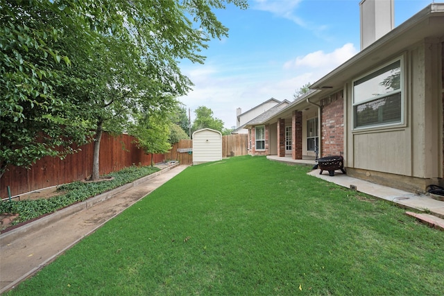 6729 Lucas Ln, North Richland Hills, TX 76182 - view of yard featuring a storage shed, an outbuilding, and a patio