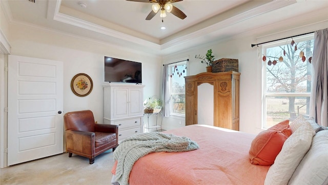 18358 Timber Oaks Dr, Lindale, TX 75771 - bedroom with multiple windows, a raised ceiling, crown molding, light colored carpet, and recessed lighting
