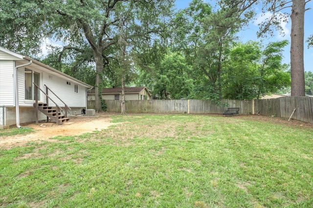 view of yard featuring entry steps