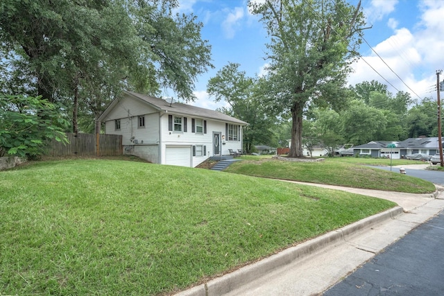 view of front of house featuring a garage and driveway