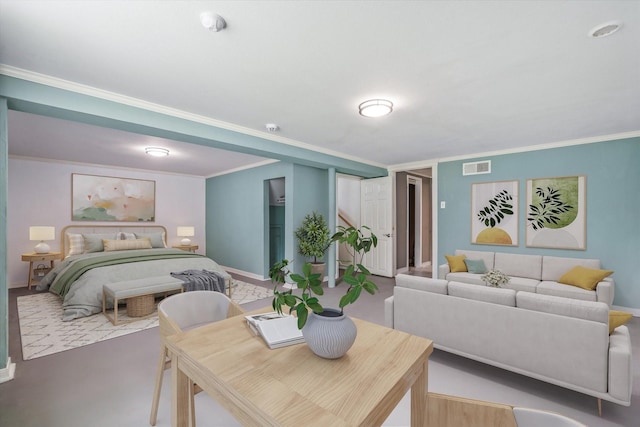 bedroom with ornamental molding and baseboards