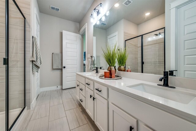 1408 Arrowwood Dr, Aubrey, TX 76227 - full bath with a shower stall, baseboards, double vanity, and recessed lighting