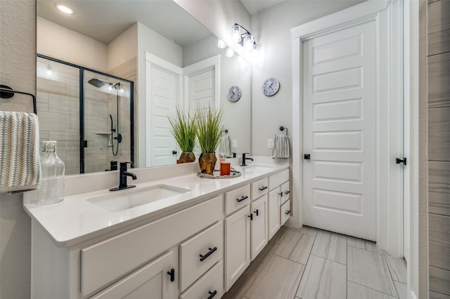 1408 Arrowwood Dr, Aubrey, TX 76227 - full bathroom with a stall shower, double vanity, and recessed lighting