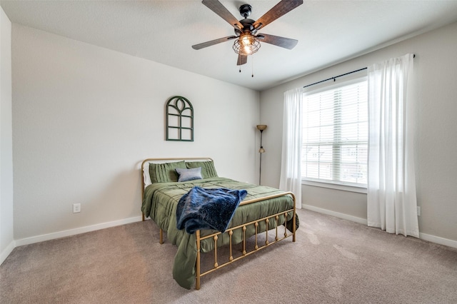 1408 Arrowwood Dr, Aubrey, TX 76227 - carpeted bedroom featuring baseboards and a ceiling fan