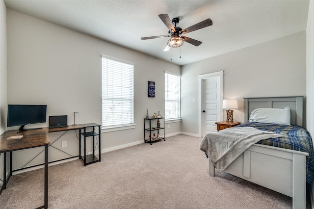1408 Arrowwood Dr, Aubrey, TX 76227 - carpeted bedroom featuring a desk, baseboards, and ceiling fan