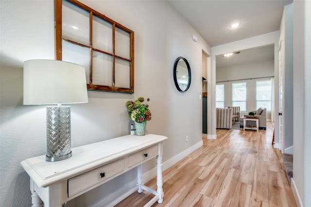 1408 Arrowwood Dr, Aubrey, TX 76227 - hall with light wood-type flooring, baseboards, and recessed lighting