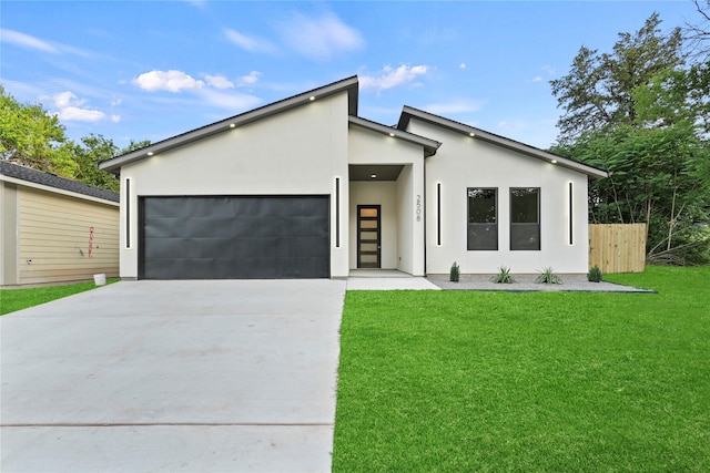 2508 Kool Ave, Dallas, TX 75241 - contemporary home featuring driveway, a garage, and stucco siding