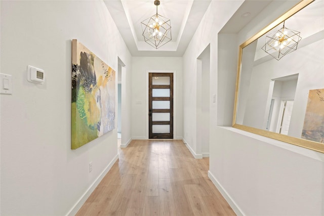 2508 Kool Ave, Dallas, TX 75241 - foyer entrance featuring a chandelier, light wood-style floors, and baseboards