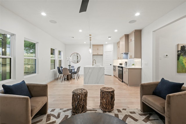 2508 Kool Ave, Dallas, TX 75241 - living room with light wood-style flooring, recessed lighting, and baseboards