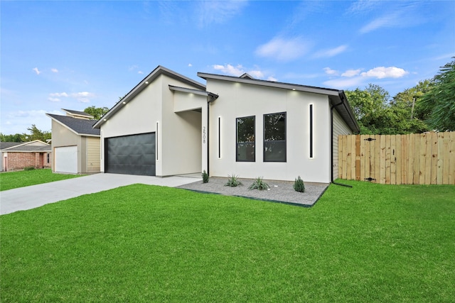 2508 Kool Ave, Dallas, TX 75241 - contemporary home featuring driveway, a garage, and stucco siding