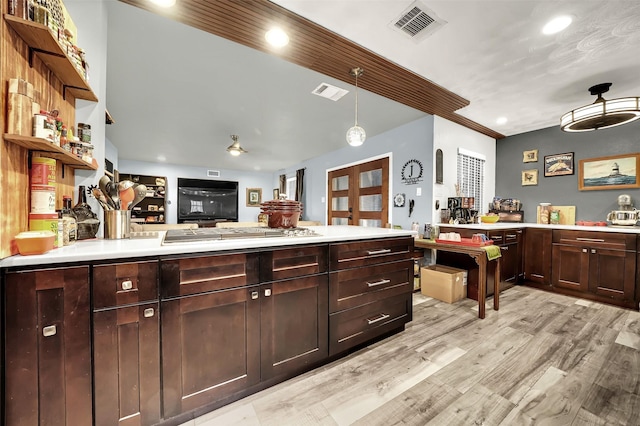 1225 Oak Meadows Dr, Dallas, TX 75232 - kitchen with recessed lighting, open shelves, light countertops, and a peninsula