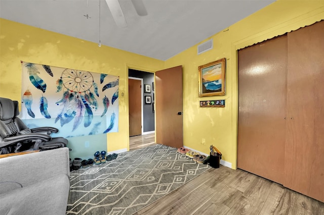 1225 Oak Meadows Dr, Dallas, TX 75232 - interior space with wood finished floors, a closet, a ceiling fan, and baseboards
