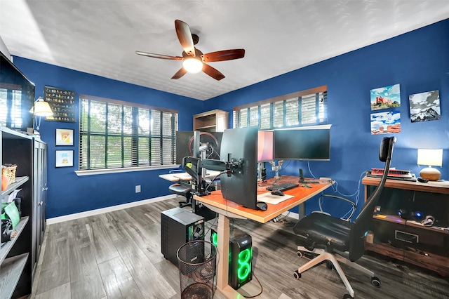 1225 Oak Meadows Dr, Dallas, TX 75232 - office area with plenty of natural light, ceiling fan, wood finished floors, and baseboards