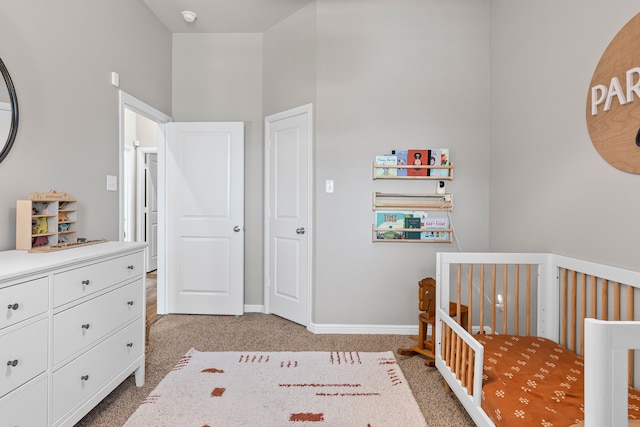 125 Singleton Dr, Royse City, TX 75189 - bedroom featuring light colored carpet, a crib, and baseboards