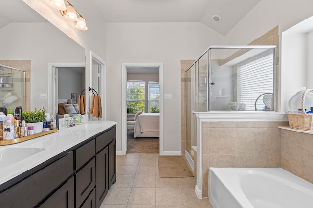 125 Singleton Dr, Royse City, TX 75189 - ensuite bathroom with lofted ceiling, tile patterned flooring, a stall shower, a garden tub, and double vanity