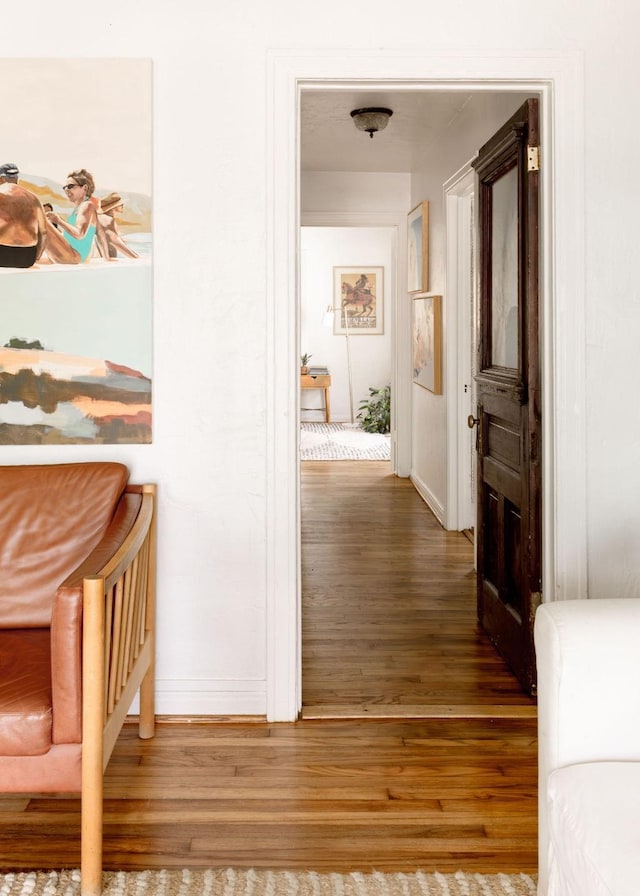 2846 Catherine St, Dallas, TX 75211 - corridor featuring wood finished floors and baseboards