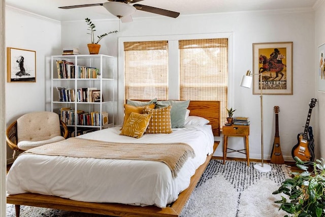 2846 Catherine St, Dallas, TX 75211 - bedroom with crown molding, wood finished floors, baseboards, and ceiling fan