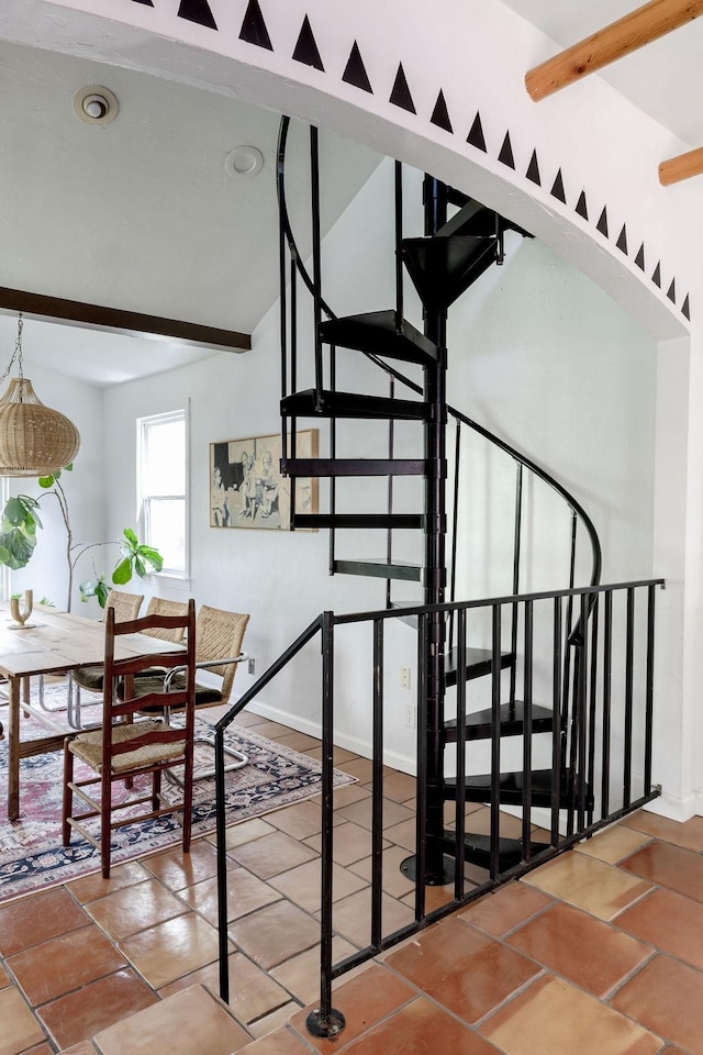 2846 Catherine St, Dallas, TX 75211 - staircase with beamed ceiling and baseboards